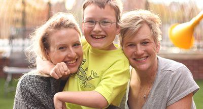 RMHC Family - mom, son and grandma out on the playground